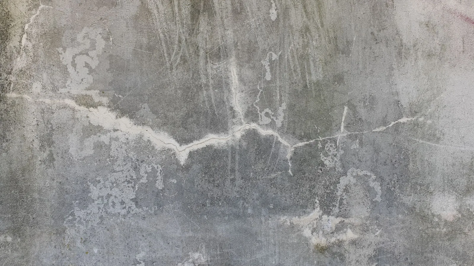how to repair cracks in concrete driveway