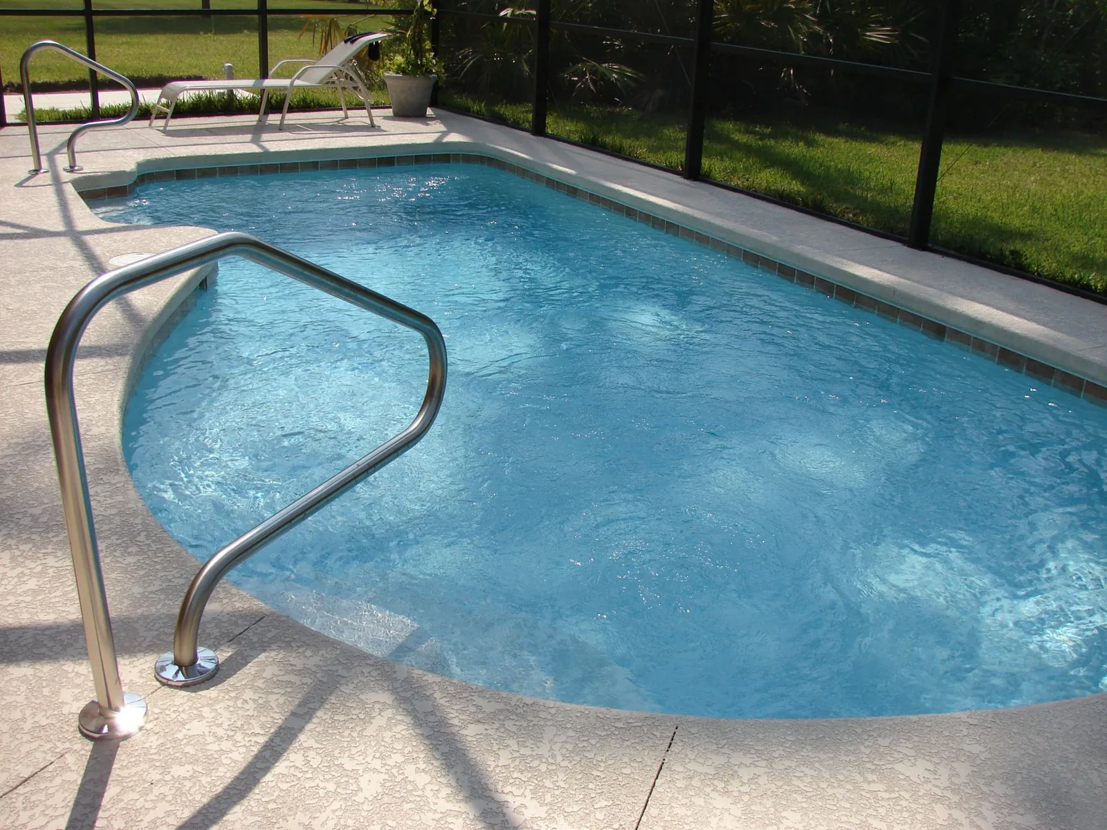 Pool deck resurfacing finishes range from acrylic coatings to stamped overlays