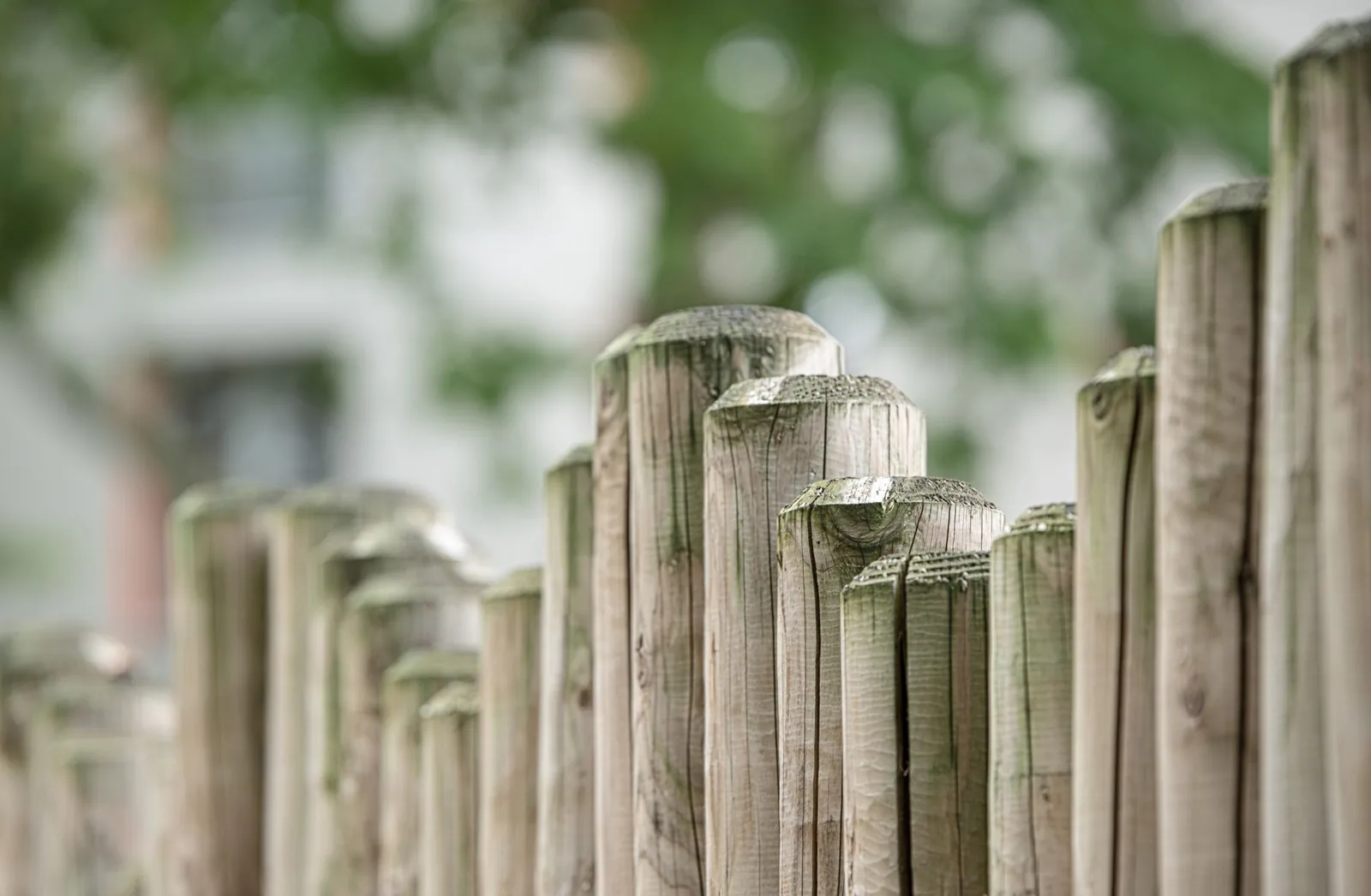 wood privacy fence with vertical pickets