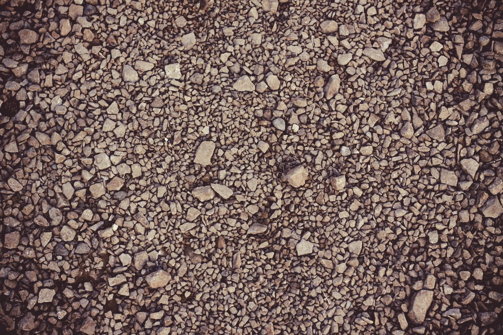Resin-bound pebble driveway with a smooth permeable finish